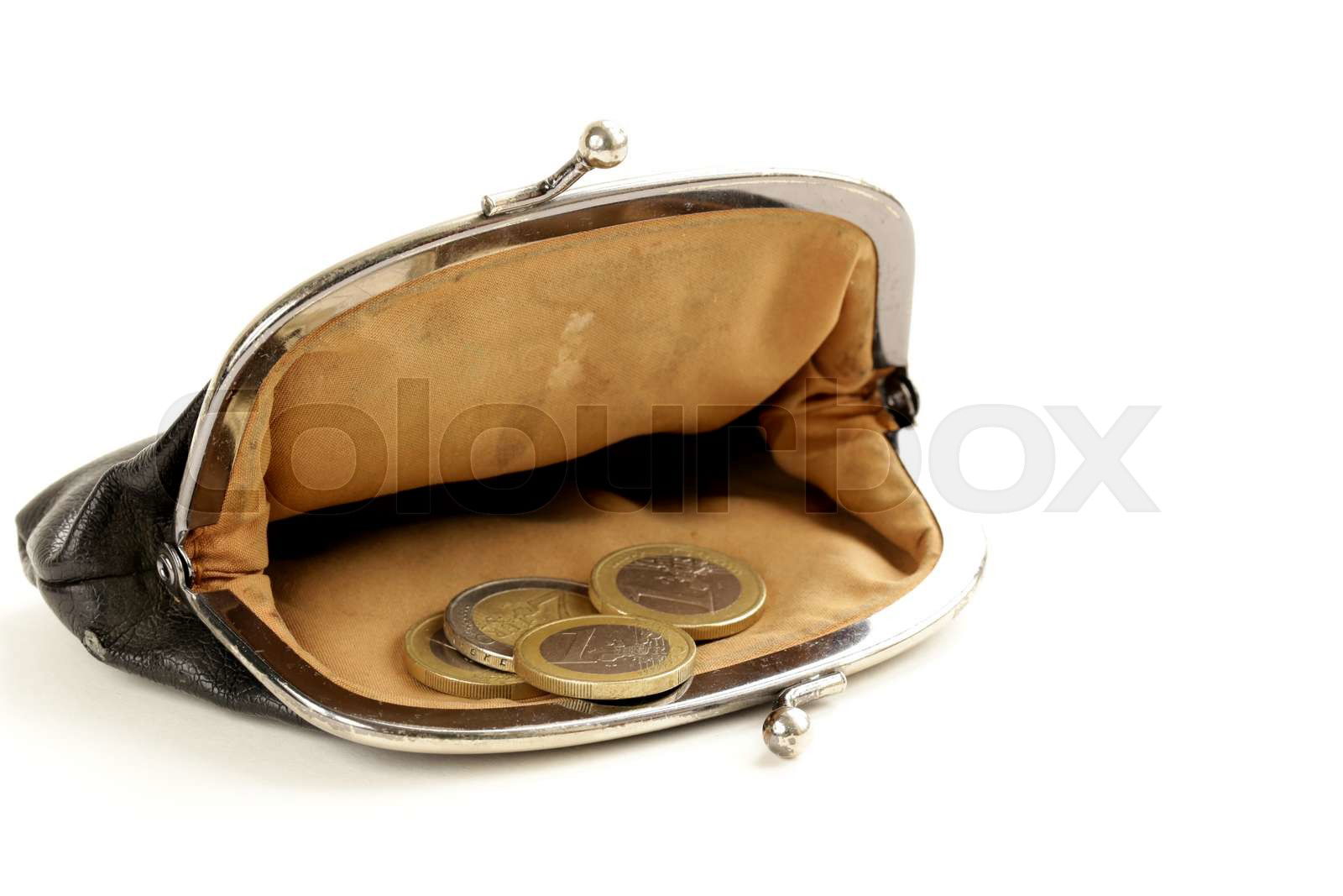 Open purse with euro coins on white background Colourbox