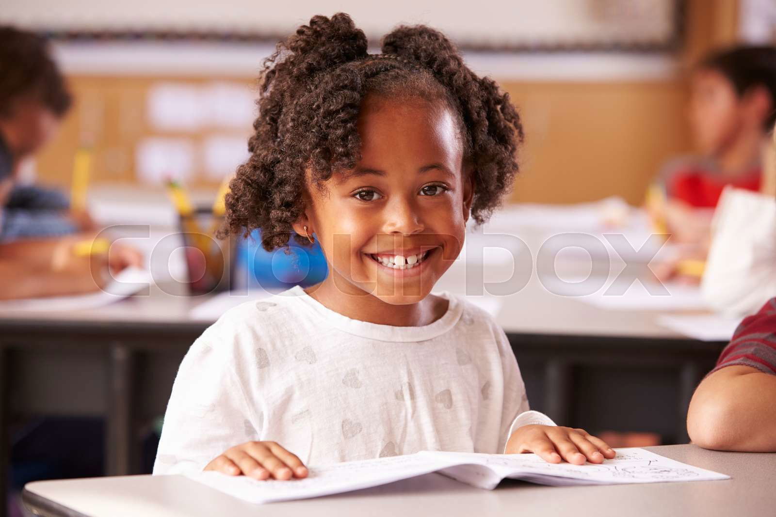 Portrait of African American elementary school girl in class Colourbox