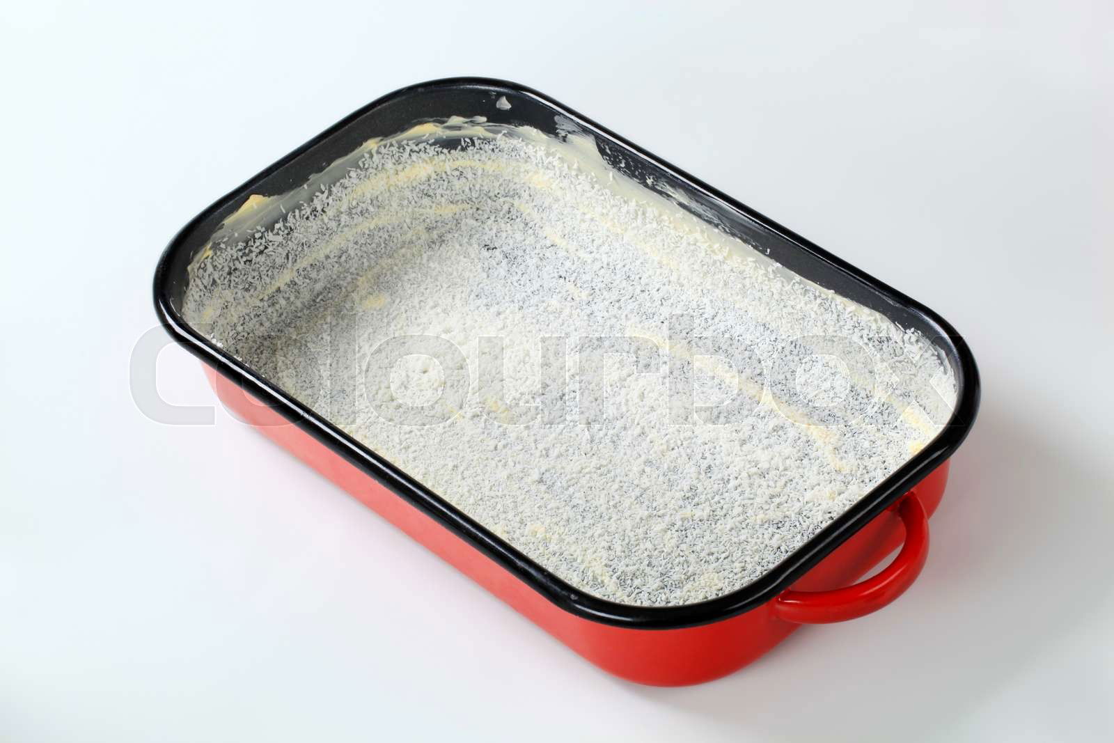 Baking pan greased with butter Colourbox