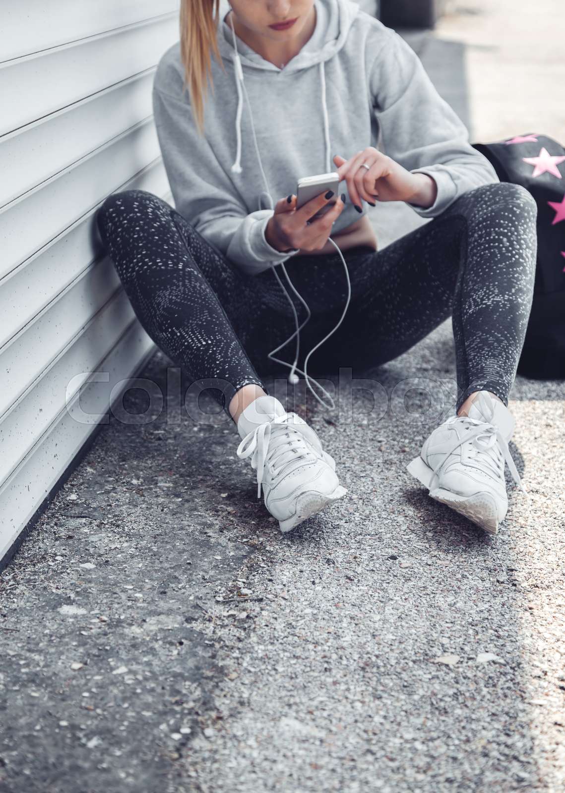 Fitness sporty girl wearing fashion sportswear and sneakers Colourbox