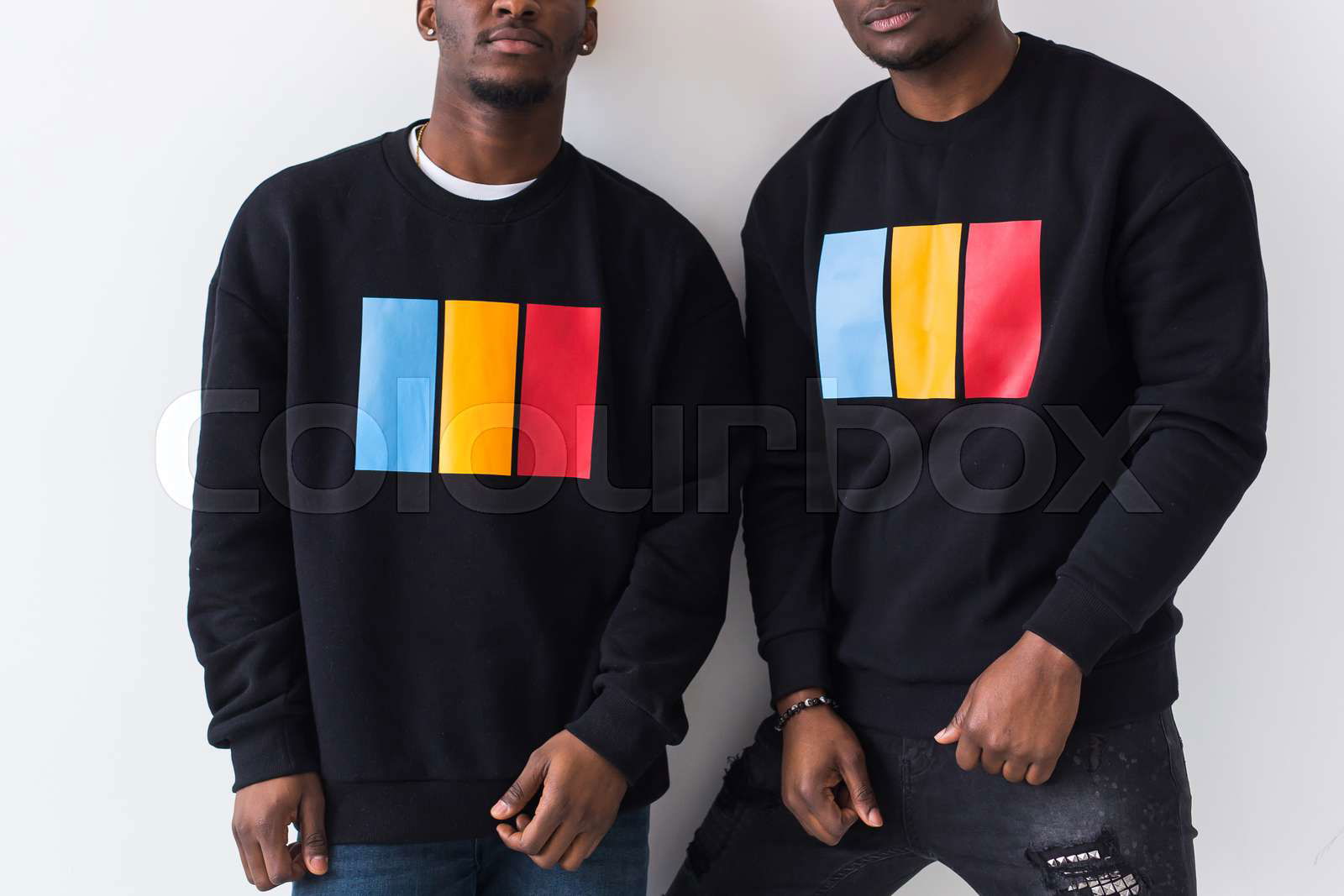 Street fashion and friendship concept Two happy african am Colourbox