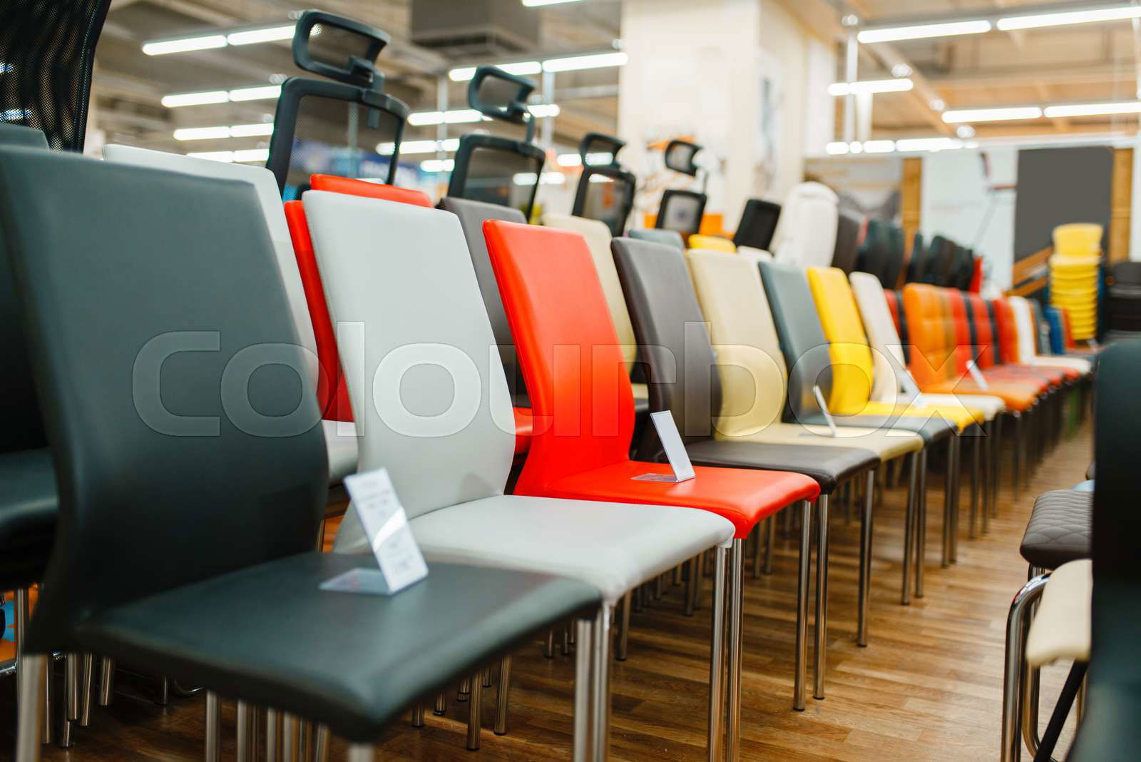 Rows of different chairs in furniture store showroom nobody Colourbox