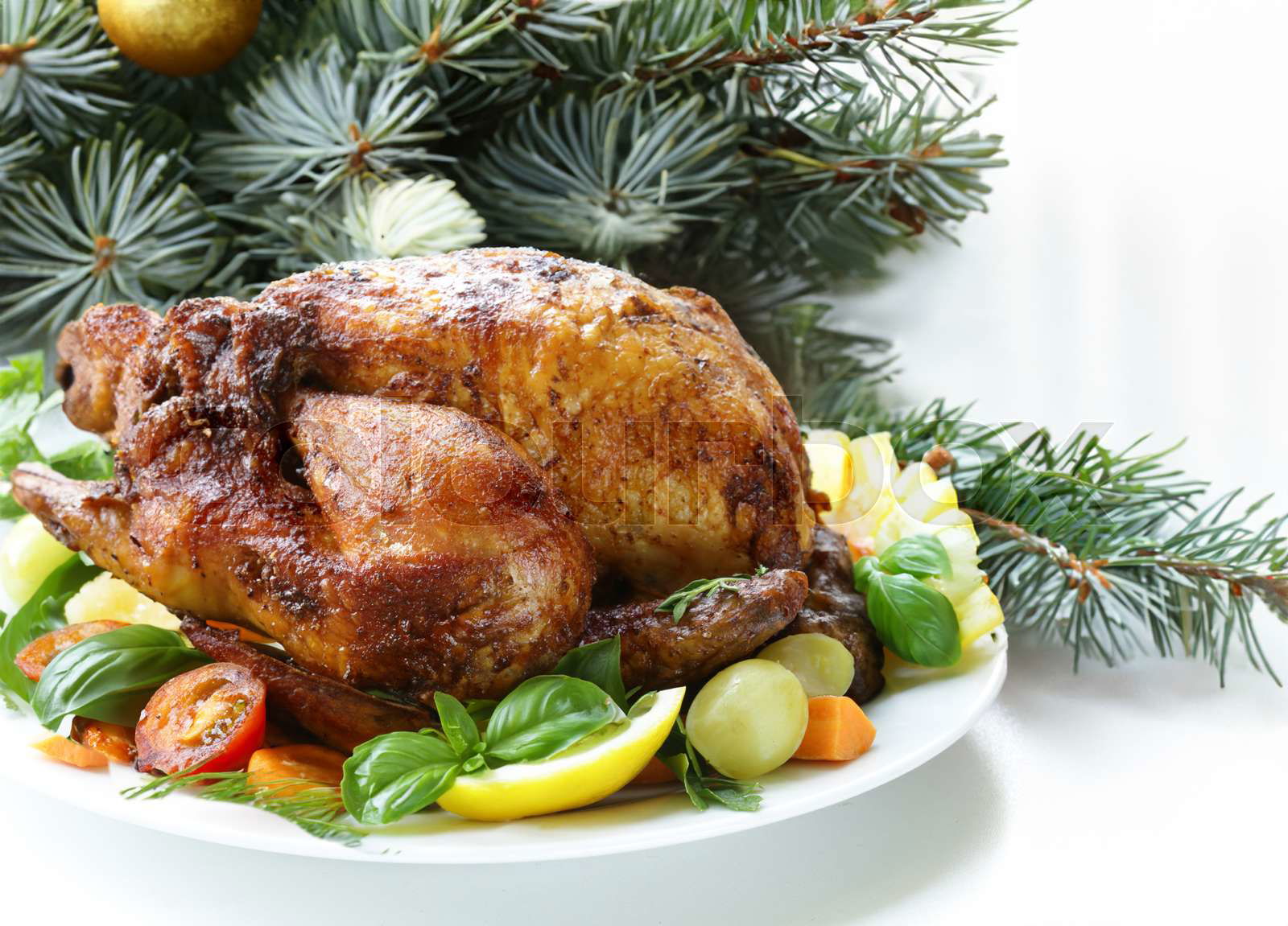 Baked whole chicken or turkey for Christmas. New Year's tabl