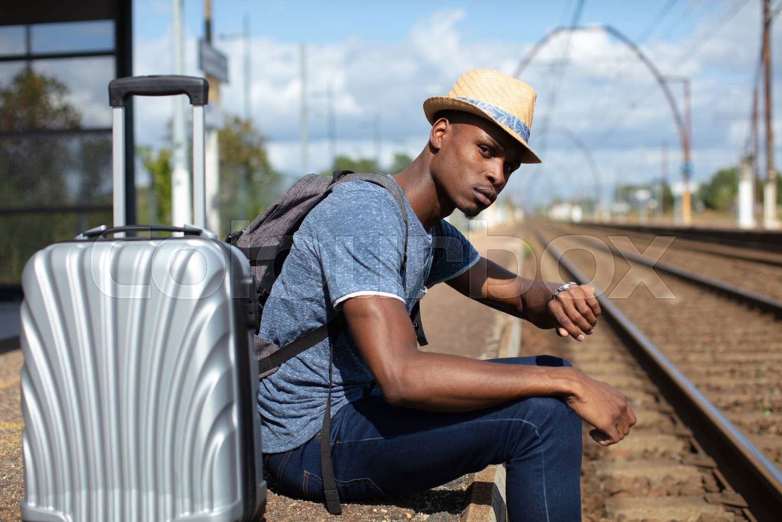 Man with travel bag online